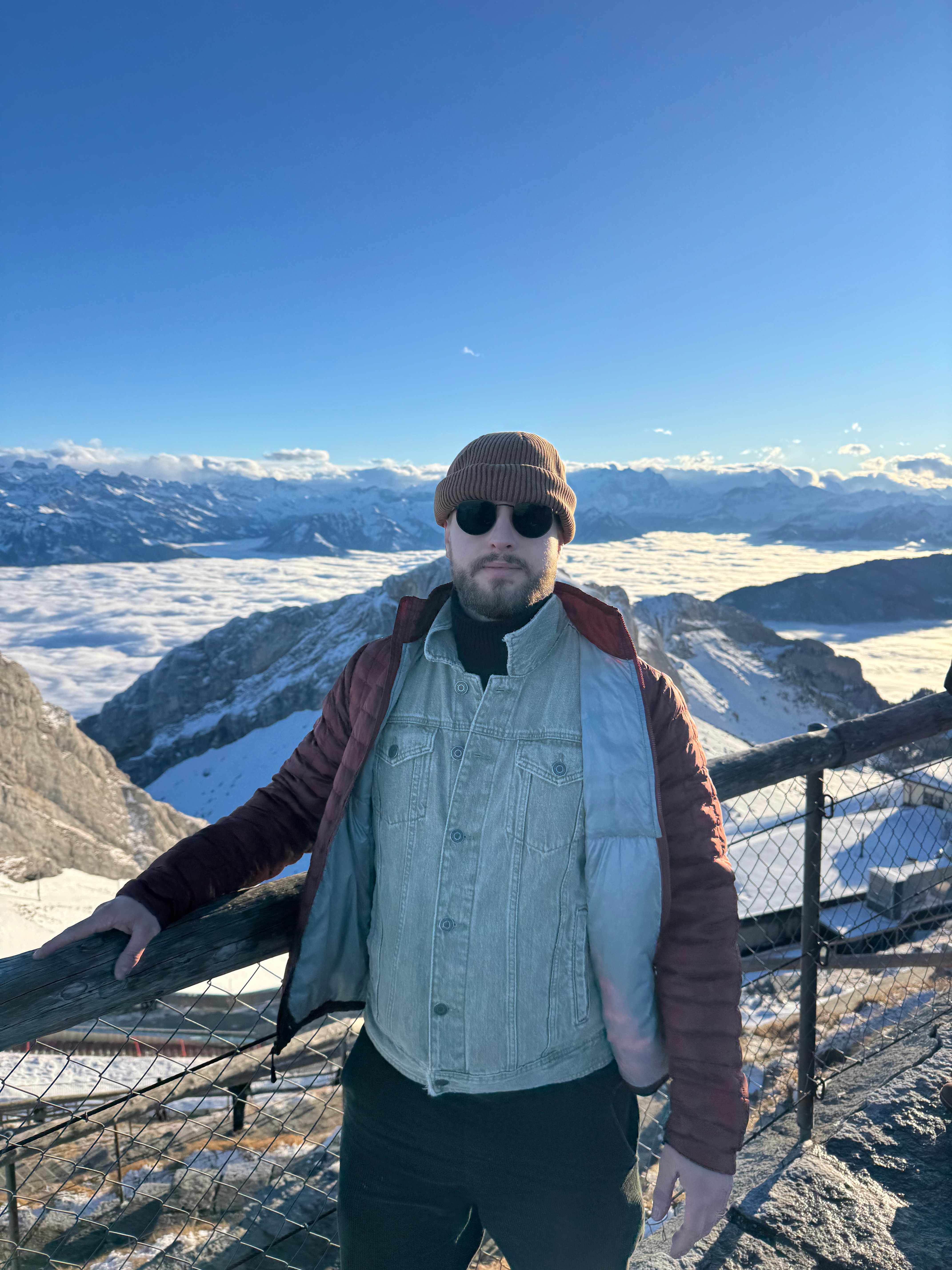 Bjorn Corning at a snowy Alpine viewpoint on Pilatus Mountain
